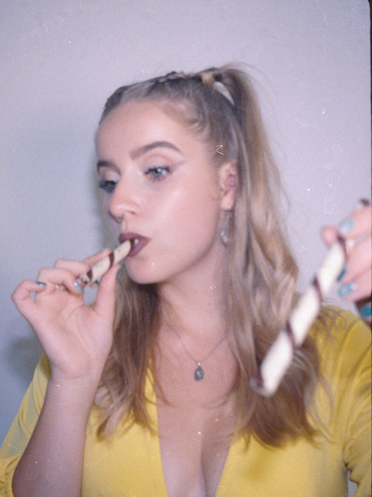 Photoshoot with musician Rhiannon Paige. Social media assets. This was created from stitching together 35mm film stills and converting the image into a gif using PS.